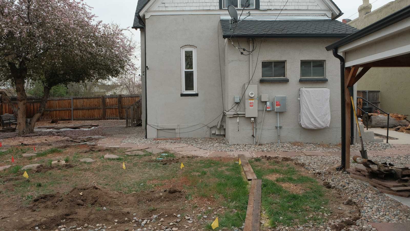 west-denver-landscaping-crew-tree-planting-skid-steer-before